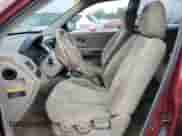 2005 Hyundai Tucson GLS z VIN KM8JN12D05U129525, wystawiony jako Copart lot #79690934 z przebiegiem 169 061 mil mil oraz Szkoda całkowita • Salvage title. Historia ofert i sprzedaży dostępna na DreamBid. Obrazek 7.