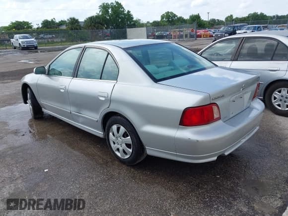 ✅ 2002 Mitsubishi Galant ES • VIN: 4A3AA46GX2E109257 • Lot: 41970244. Listed on IAAI with 104,553 mi. Free auction sales archive from the USA and detailed vehicle history report at DreamBid. Image 3.