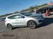 2016 Hyundai Santa Fe z VIN 5XYZTDLB8GG351827, wystawiony jako IAAI lot #43425613 z przebiegiem 145 079 mil mil oraz . Historia ofert i sprzedaży dostępna na DreamBid. Obrazek 14.