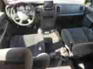 2005 Dodge 1500 SLT z VIN 1D7HA18D45J500585, wystawiony jako Copart lot #68624344 z przebiegiem 167 324 mil mil oraz Szkoda całkowita • Salvage title. Historia ofert i sprzedaży dostępna na DreamBid. Obrazek 8.