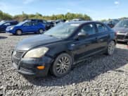 ✅ 2010 Suzuki Kizashi SE • VIN: JS2RE9A36A6100825 • Lot: 83776115. Listed on Copart with 153,435 mi. Free auction sales archive from the USA and detailed vehicle history report at DreamBid. Image 1.