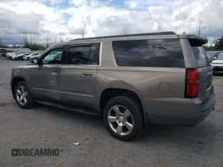 2018 Chevrolet Suburban LS z VIN 1GNSKGKC8JR396475, wystawiony jako Copart lot #75859654 z przebiegiem 67 080 mil mil oraz Szkoda całkowita • Salvage title. Historia ofert i sprzedaży dostępna na DreamBid. Obrazek 2.