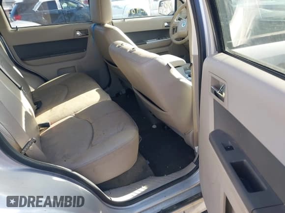 ✅ 2010 Mercury Mariner Premier • VIN: 4M2CN8HG8AKJ10048 • Lot: 41197649. Listed on IAAI with 176,248 mi. Free auction sales archive from the USA and detailed vehicle history report at DreamBid. Image 8.