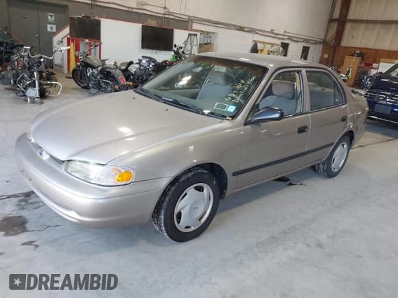 ✅ 2000 Chevrolet Prizm • VIN: 1Y1SK5281YZ435776 • Lot: 43143014. Listed on IAAI with 123,303 mi. Free auction sales archive from the USA and detailed vehicle history report at DreamBid. Image 2.