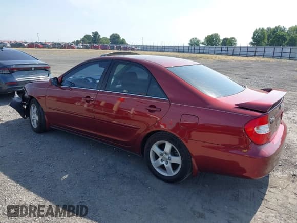 ✅ 2002 Toyota Camry XLE • VIN: 4T1BF32KX2U007388 • Lot: 42700130. Listed on IAAI with 202,034 mi. Free auction sales archive from the USA and detailed vehicle history report at DreamBid. Image 3.