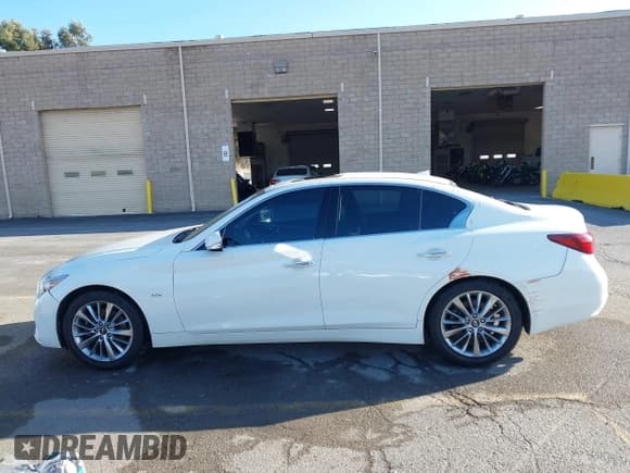 ✅ 2019 Infiniti Q50 Luxe • VIN: JN1EV7AP8KM519758 • Lot: 43408442. Listed on IAAI with 94,434 mi. Free auction sales archive from the USA and detailed vehicle history report at DreamBid. Image 13.