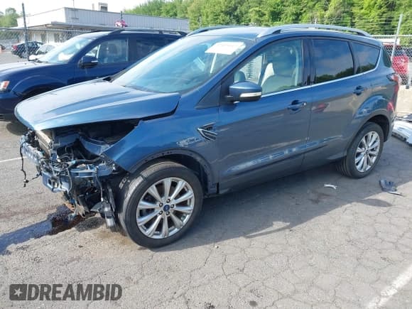✅ 2018 Ford Escape Titanium • VIN: 1FMCU9J92JUB01162 • Lot: 42495112. Listed on IAAI with 96,280 mi. Free auction sales archive from the USA and detailed vehicle history report at DreamBid. Image 2.