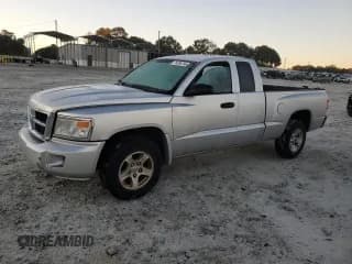 ✅ 2010 Dodge Dakota • VIN: 1D7CE2BK6AS135357 • Лот: 76288794. Опубликован ранее на Copart с пробегом 290 816 миль. Бесплатный доступ к архиву аукционных продаж из США и подробный отчёт об истории автомобиля на DreamBid. Изображение 1.