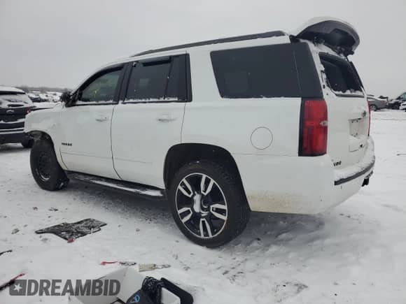 2020 Chevrolet Tahoe Premier with VIN 1GNSKCKJXLR182971, listed as a Copart auction lot 87268634 with 210,000 mi miles and Salvage title. Bid and sale history available at DreamBid. Image 2.