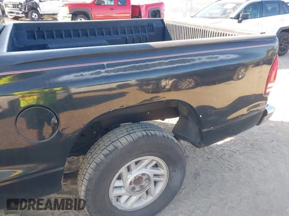 ✅ 2000 Dodge Dakota Sport • VIN: 1B7GL2AN2YS776819 • Lot: 42066658. Wystawiony na IAAI z przebiegiem 250 880 mil. Bezpłatny archiwum sprzedaży aukcyjnych z USA i szczegółowy raport historii pojazdu na DreamBid. Zdjęcie 14.