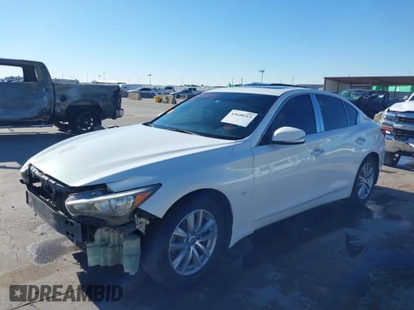 ✅ 2014 Infiniti Q50 Premium • VIN: JN1BV7ARXEM687779 • Lot: 43640213. Listed on IAAI with 187,762 mi. Free auction sales archive from the USA and detailed vehicle history report at DreamBid. Image 20.