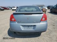 ✅ 2009 Pontiac G6 1SB • VIN: 1G2ZJ57K894241663 • Лот: 58259325. Опубликован ранее на Copart с пробегом 154 926 миль. Бесплатный доступ к архиву аукционных продаж из США и подробный отчёт об истории автомобиля на DreamBid. Изображение 6.