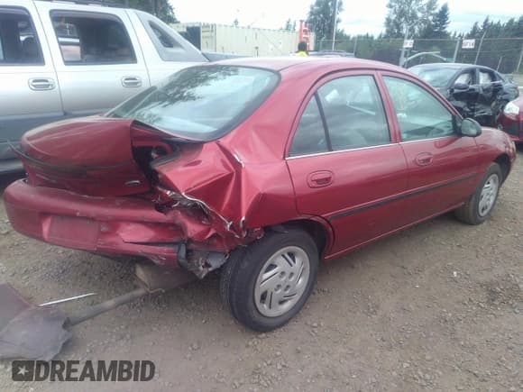 ✅ 1998 Ford Escort LX • VIN: 1FAFP10P4WW140458 • Lot: 37094590. Listed on IAAI with 216,895 mi. Free auction sales archive from the USA and detailed vehicle history report at DreamBid. Image 4.