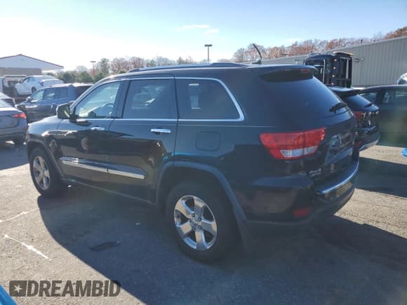 ✅ 2013 Jeep Grand Cherokee Limited • VIN: 1C4RJFBG6DC503084 • Lot: 93554215. Listed on Copart with 215,893 mi. Free auction sales archive from the USA and detailed vehicle history report at DreamBid. Image 2.