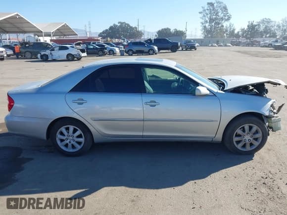 ✅ 2003 Toyota Camry LE • VIN: 4T1BF32K23U554530 • Lot: 43641823. Wystawiony na IAAI z przebiegiem 167 772 mil. Bezpłatny archiwum sprzedaży aukcyjnych z USA i szczegółowy raport historii pojazdu na DreamBid. Zdjęcie 14.