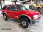 2004 Chevrolet Blazer LS with VIN 1GNCT18X74K121475, listed as a IAAI auction lot 41770798 with 168,634 mi miles and . Bid and sale history available at DreamBid. Image 1.