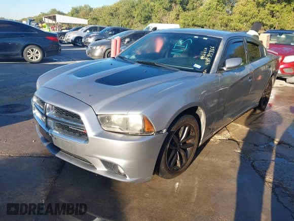 2014 Dodge Charger SXT with VIN 2C3CDXHG2EH239214, listed as a IAAI auction lot 43595966 with 219,931 mi miles and . Bid and sale history available at DreamBid. Image 17.