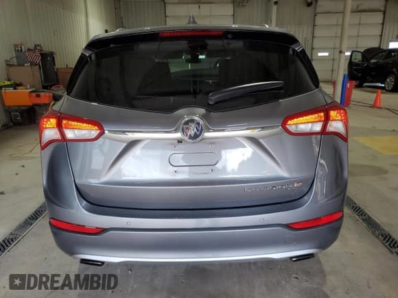 ✅ 2020 Buick Envision Premium • VIN: LRBFX3SX0LD137999 • Лот: 70746225. Опубликован ранее на Copart с пробегом 56 953 миль. Бесплатный доступ к архиву аукционных продаж из США и подробный отчёт об истории автомобиля на DreamBid. Изображение 6.