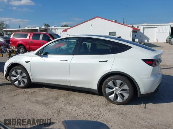 ✅ 2023 Tesla Model Y • VIN: 7SAYGDED4PF931973 • Lot: 43560786. Listed on IAAI with 39,931 mi. Free auction sales archive from the USA and detailed vehicle history report at DreamBid. Image 14.