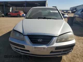 2006 Hyundai Elantra GLS z VIN KMHDN56D96U183082, wystawiony jako Copart lot #76459614 z przebiegiem 107 365 mil mil oraz Czysty tytuł • Clean title. Historia ofert i sprzedaży dostępna na DreamBid. Obrazek 5.