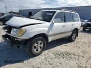 ✅ 2002 Toyota Land Cruiser • VIN: JTEHT05J022023356 • Lot: 80920884. Listed on Copart with 359,995 mi. Free auction sales archive from the USA and detailed vehicle history report at DreamBid. Image 1.