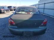 ✅ 2002 Kia Rio • VIN: KNADC123226128937 • Lot: 89225035. Listed on Copart with 218,436 mi. Free auction sales archive from the USA and detailed vehicle history report at DreamBid. Image 6.