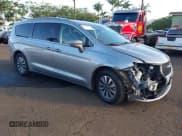 ✅ 2021 Chrysler Pacifica Hybrid Touring L • VIN: 2C4RC1L7XMR581385 • Lot: 43566058. Listed on IAAI with 6,979 mi. Free auction sales archive from the USA and detailed vehicle history report at DreamBid. Image 1.