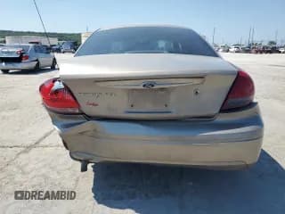 ✅ 2006 Ford Taurus SEL • VIN: 1FAFP56U26A234033 • Lot: 71208205. Wystawiony na Copart z przebiegiem 174 626 mil. Bezpłatny archiwum sprzedaży aukcyjnych z USA i szczegółowy raport historii pojazdu na DreamBid. Zdjęcie 6.