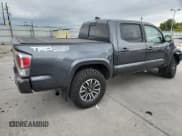 ✅ 2023 Toyota Tacoma TRD Sport • VIN: 3TMCZ5AN1PM557548 • Лот: 82419795. Опубликован ранее на Copart с пробегом 58 725 миль. Бесплатный доступ к архиву аукционных продаж из США и подробный отчёт об истории автомобиля на DreamBid. Изображение 3.