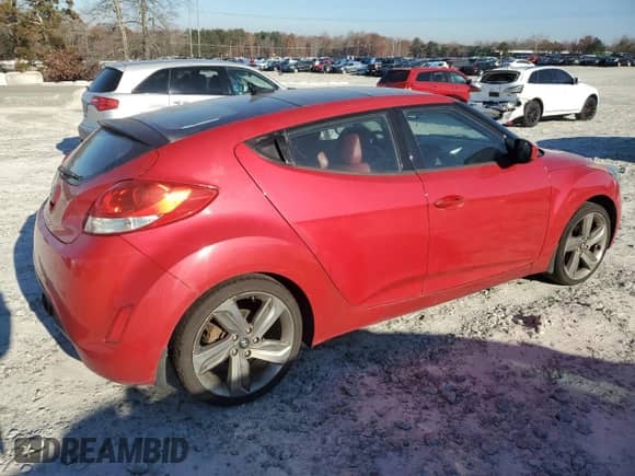 2012 Hyundai Veloster w/Red Int z VIN KMHTC6AD9CU084434, wystawiony jako Copart lot #83387244 z przebiegiem 177 841 mil mil oraz Czysty tytuł • Clean title. Historia ofert i sprzedaży dostępna na DreamBid. Obrazek 3.