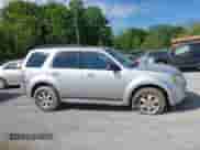 2010 Mercury Mariner with VIN 4M2CN9BG0AKJ21754, listed as a IAAI auction lot 42192286 with 196,749 mi miles and . Bid and sale history available at DreamBid. Image 14.