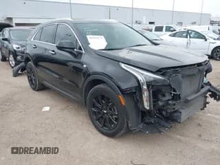 ✅ 2023 Cadillac XT4 FWD Luxury • VIN: 1GYAZAR49PF128552 • Лот: 41806172. Опубликован ранее на IAAI с пробегом 36 081 миль. Бесплатный доступ к архиву аукционных продаж из США и подробный отчёт об истории автомобиля на DreamBid. Изображение 1.