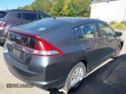 ✅ 2012 Honda Insight • VIN: JHMZE2H37CS006159 • Lot: 43380789. Listed on IAAI with 182,815 mi. Free auction sales archive from the USA and detailed vehicle history report at DreamBid. Image 4.