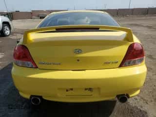 2005 Hyundai Tiburon GT с VIN KMHHN65F75U170498, выставлен на аукционе Copart как лот 58391985 с пробегом 190 374 миль миль и Списание • Salvage title. История ставок и продаж доступна на DreamBid. Изображение 6.