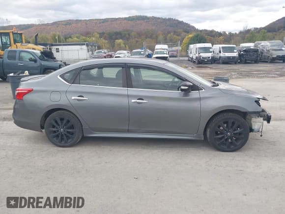 ✅ 2017 Nissan Sentra SR Turbo • VIN: 3N1CB7AP2HY321991 • Lot: 43511713. Wystawiony na IAAI z przebiegiem 104 810 mil. Bezpłatny archiwum sprzedaży aukcyjnych z USA i szczegółowy raport historii pojazdu na DreamBid. Zdjęcie 13.