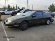 ✅ 1997 Saturn SC • VIN: 1G8ZF1286VZ350275 • Лот: 83010514. Опубликован ранее на Copart с пробегом 143 241 миль. Бесплатный доступ к архиву аукционных продаж из США и подробный отчёт об истории автомобиля на DreamBid. Изображение 1.