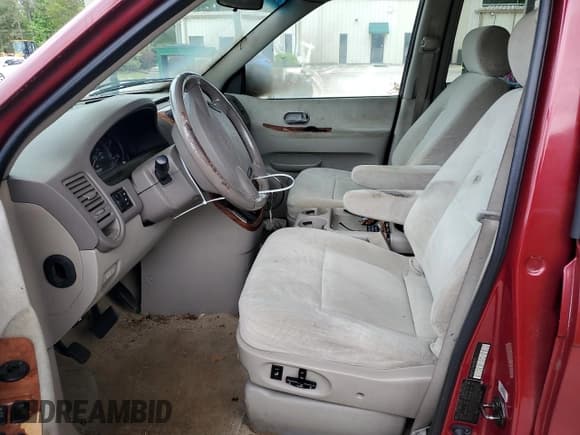 ✅ 2004 Kia Sedona LX • VIN: KNDUP131746548782 • Lot: 55325085. Wystawiony na Copart z przebiegiem Nie podano. Bezpłatny archiwum sprzedaży aukcyjnych z USA i szczegółowy raport historii pojazdu na DreamBid. Zdjęcie 7.