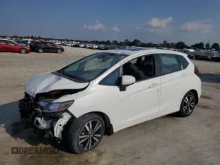 ✅ 2018 Honda Fit EX • VIN: 3HGGK5H81JM721525 • Лот: 80523445. Опубликован ранее на Copart с пробегом 24 952 миль. Бесплатный доступ к архиву аукционных продаж из США и подробный отчёт об истории автомобиля на DreamBid. Изображение 1.