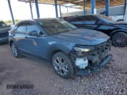 ✅ 2020 Mazda CX-30 Premium • VIN: 3MVDMAEMXLM122033 • Lot: 81964355. Wystawiony na Copart z przebiegiem 54 508 mil. Bezpłatny archiwum sprzedaży aukcyjnych z USA i szczegółowy raport historii pojazdu na DreamBid. Zdjęcie 4.