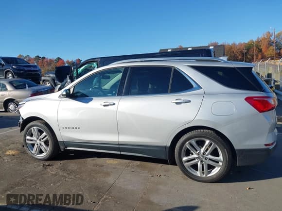 ✅ 2018 Chevrolet Equinox Premier • VIN: 2GNAXVEV6J6312308 • Лот: 43537199. Опубликован ранее на IAAI с пробегом 169 894 миль. Бесплатный доступ к архиву аукционных продаж из США и подробный отчёт об истории автомобиля на DreamBid. Изображение 14.