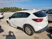 ✅ 2014 Mazda CX-5 Sport • VIN: JM3KE2BE6E0335437 • Lot: 91245865. Listed on Copart with 160,818 mi. Free auction sales archive from the USA and detailed vehicle history report at DreamBid. Image 1.