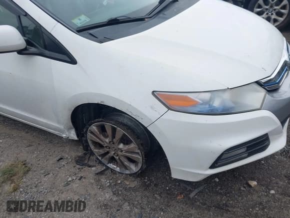 ✅ 2012 Honda Insight EX • VIN: JHMZE2H7XCS005882 • Lot: 43660260. Listed on IAAI with 283,380 mi. Free auction sales archive from the USA and detailed vehicle history report at DreamBid. Image 6.