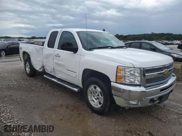 2012 Chevrolet Silverado 1500 LT with VIN 1GCRKSE00CZ163866, listed as a Copart auction lot 65593405 with 217,489 mi miles and Salvage title. Bid and sale history available at DreamBid. Image 4.