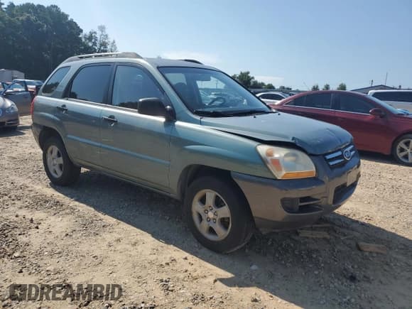 ✅ 2008 Kia Sportage LX • VIN: KNDJF724587465940 • Lot: 69298245. Listed on Copart with 201,770 mi. Free auction sales archive from the USA and detailed vehicle history report at DreamBid. Image 4.