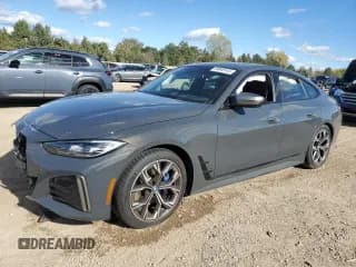 ✅ 2024 BMW i4 M50 • VIN: WBY33AW06RFR83552 • Лот: 89640145. Опубликован ранее на Copart с пробегом 11 007 миль. Бесплатный доступ к архиву аукционных продаж из США и подробный отчёт об истории автомобиля на DreamBid. Изображение 1.