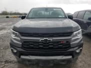 ✅ 2021 Chevrolet Colorado 4WD Z71 • VIN: 1GCGTDEN3M1273323 • Lot: 55360005. Listed on Copart with 52,679 mi. Free auction sales archive from the USA and detailed vehicle history report at DreamBid. Image 5.