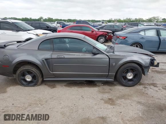 ✅ 2003 Ford Mustang Standard • VIN: 1FAFP40473F383331 • Lot: 42128521. Listed on IAAI with 226,165 mi. Free auction sales archive from the USA and detailed vehicle history report at DreamBid. Image 13.