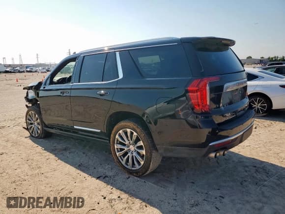 ✅ 2021 GMC Yukon Denali • VIN: 1GKS1DKL2MR365841 • Lot: 71232065. Listed on Copart with 67,549 mi. Free auction sales archive from the USA and detailed vehicle history report at DreamBid. Image 2.