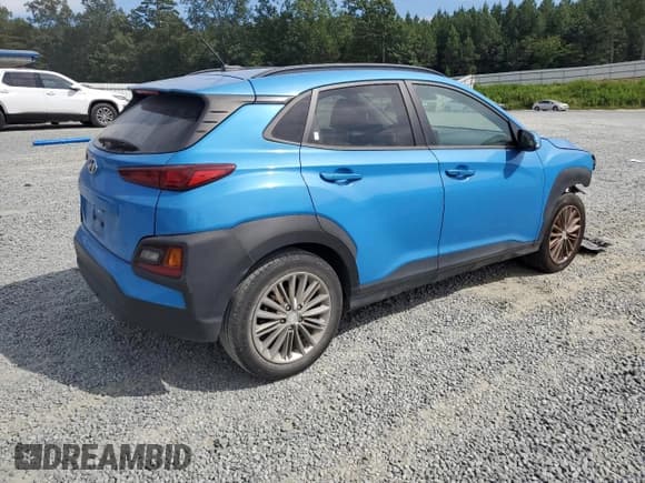 ✅ 2021 Hyundai Kona SEL • VIN: KM8K22AA5MU604871 • Лот: 69923865. Опубликован ранее на Copart с пробегом 83 517 миль. Бесплатный доступ к архиву аукционных продаж из США и подробный отчёт об истории автомобиля на DreamBid. Изображение 3.