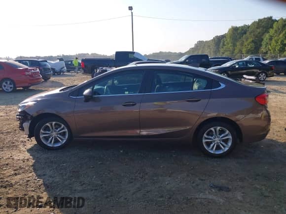 2019 Chevrolet Cruze LT with VIN 1G1BE5SM3K7137024, listed as a IAAI auction lot 43209295 with 90,633 mi miles and . Bid and sale history available at DreamBid. Image 15.